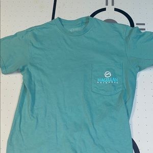 Magellan shirt with fish design on back.